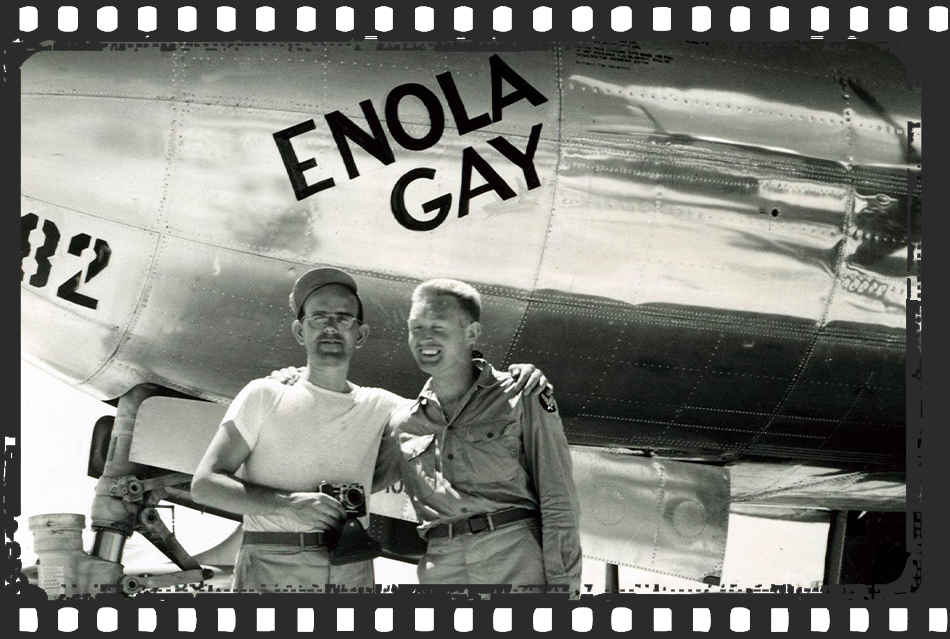 Adolph in front of Enola Gay